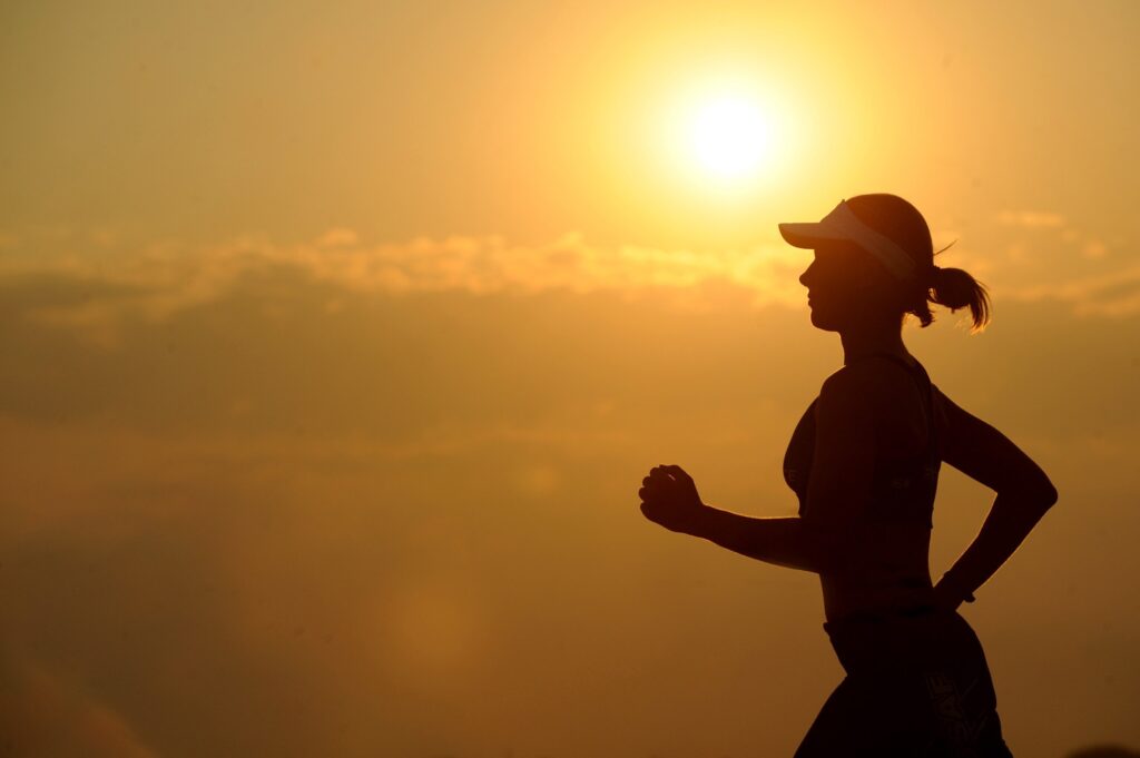 Athlete running in the sun